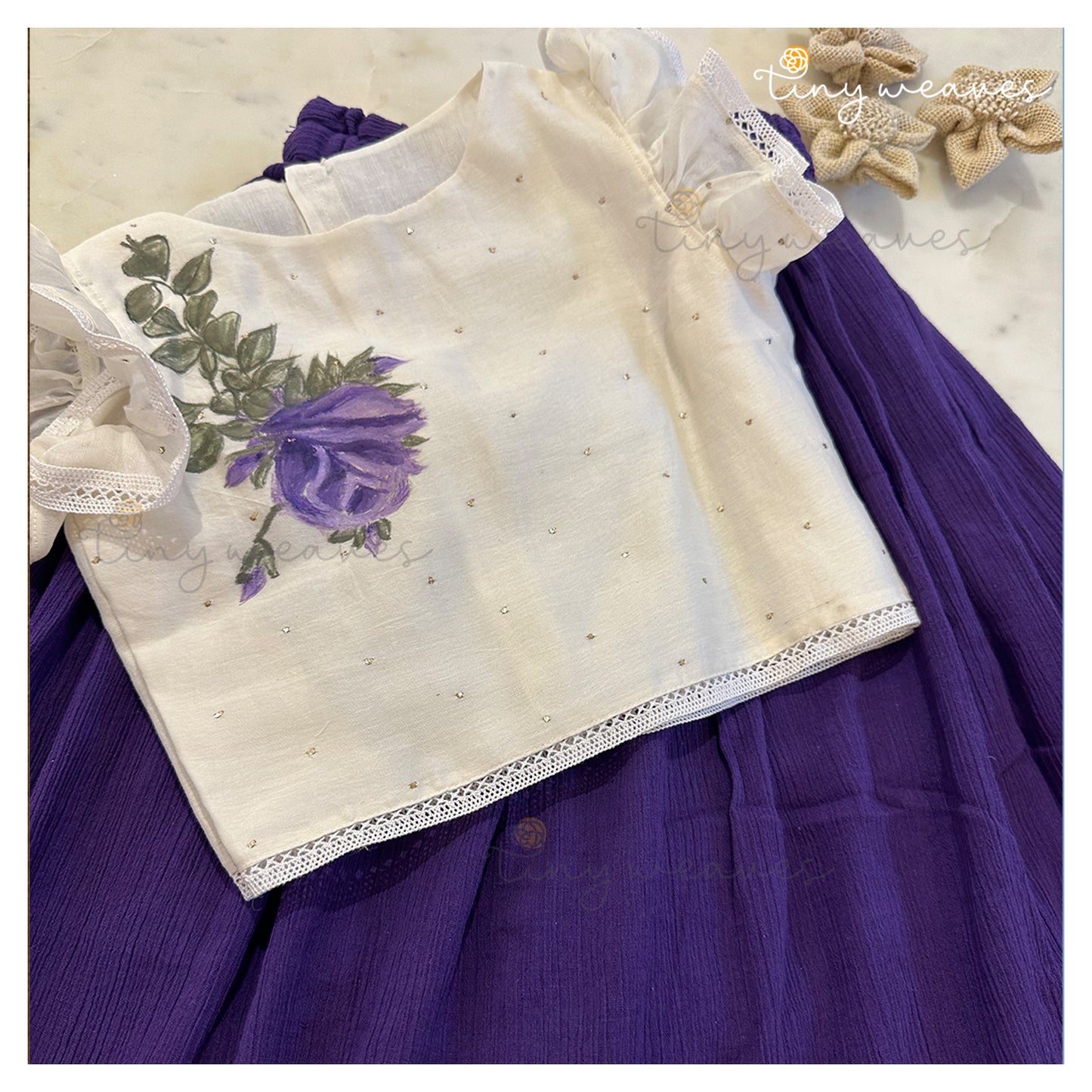 Falling rose set in purple