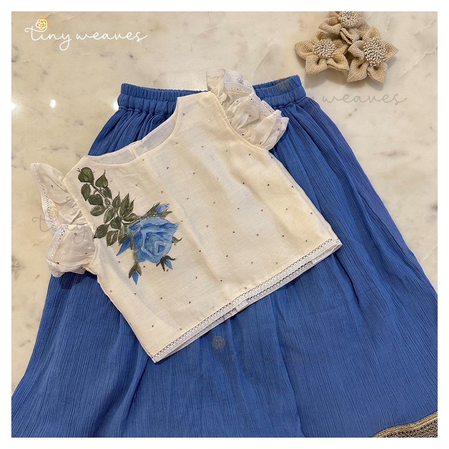 Falling rose set in blue