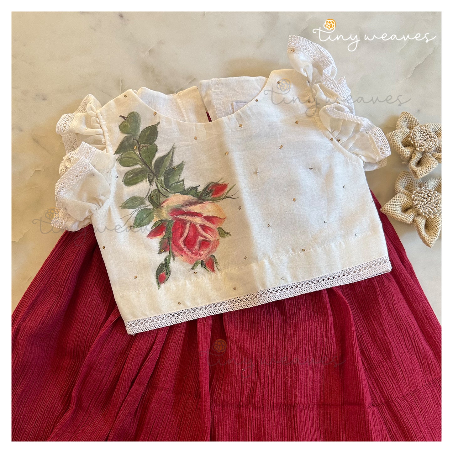 Falling rose set in red