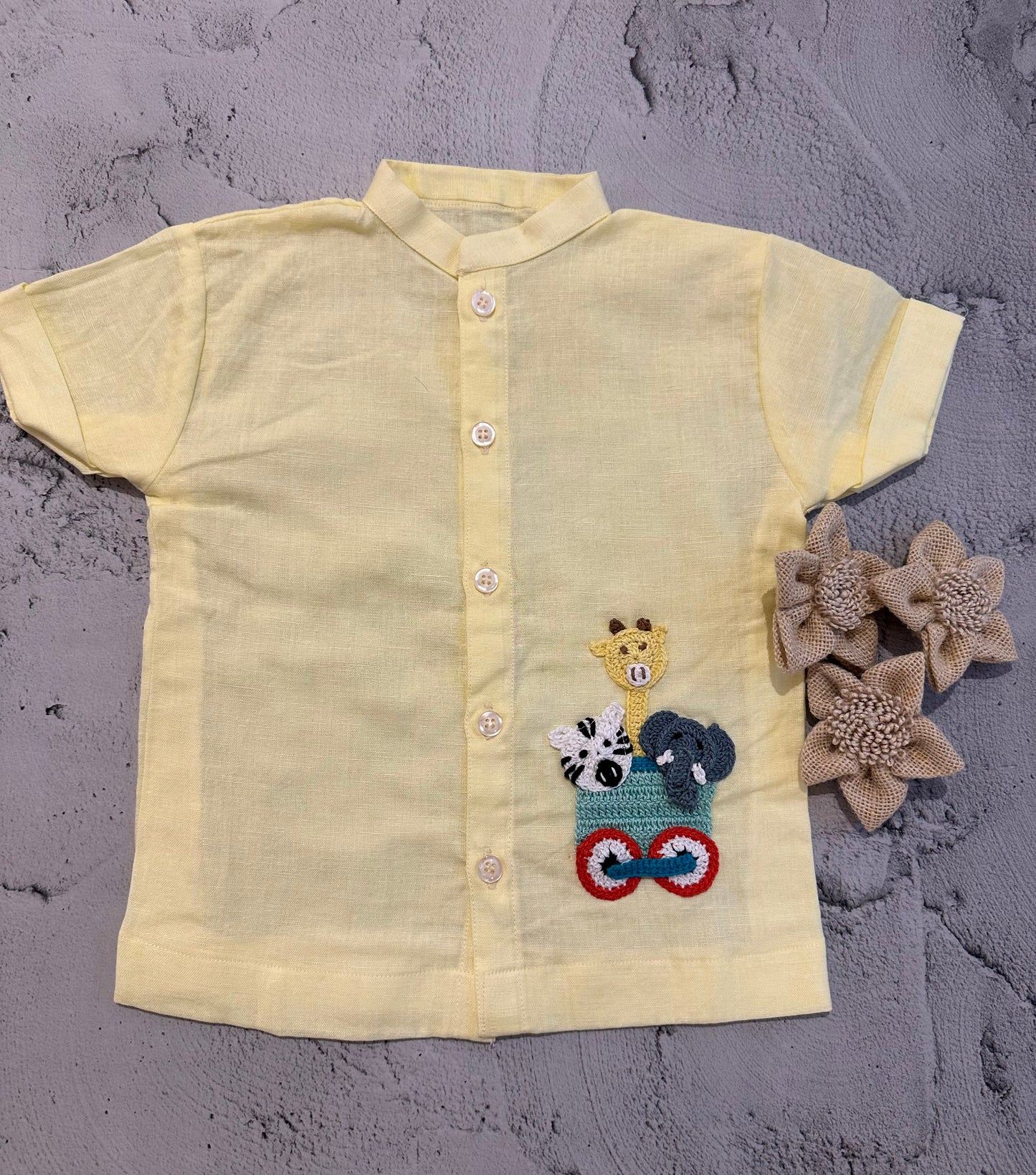 Yellow kart wheel crochet shirt