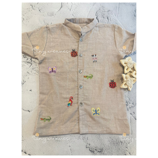 Bugs and birds cross stitch shirt