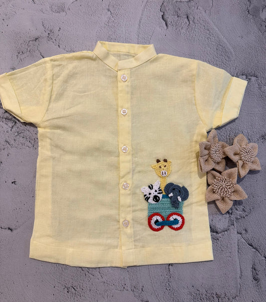 Yellow kart wheel crochet shirt