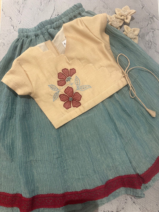 beige and blue appliqué skirt set